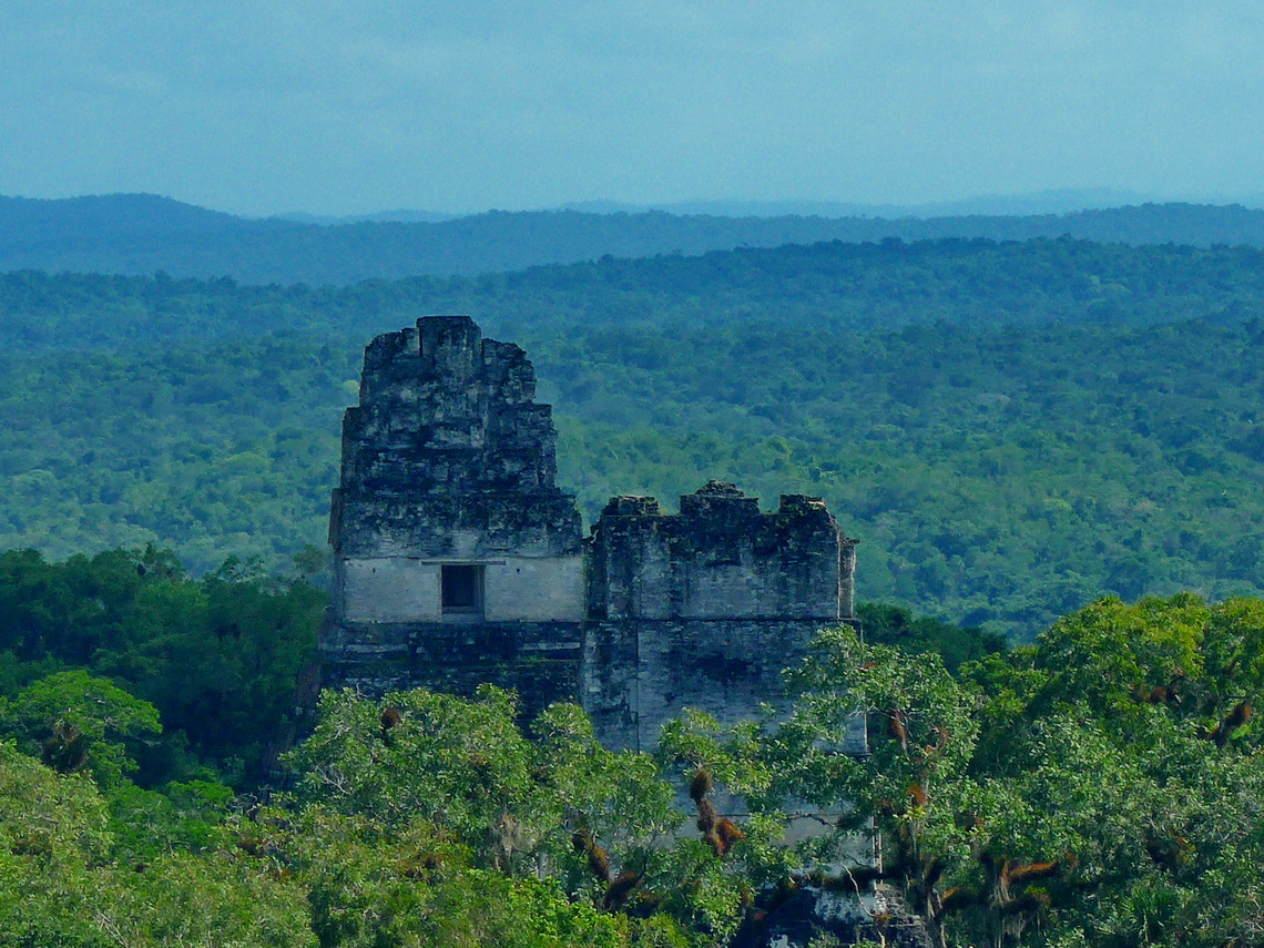 Temple of the Great Jaguar - one of the very steep pyramids of Tikal and its most spectacular (left)